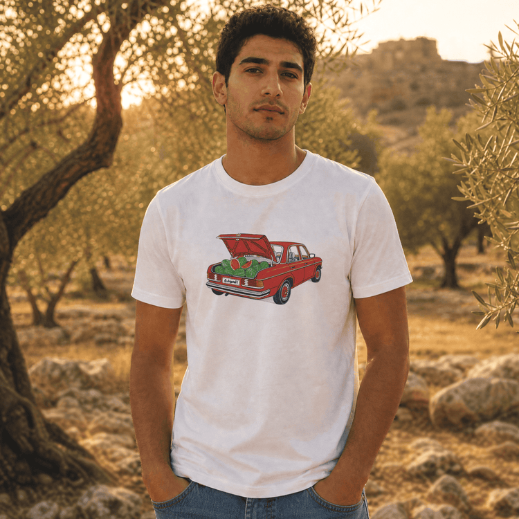 Model wearing Awda watermelon graphic heavyweight unisex t-shirt in white, Palestinian heritage streetwear by BOSA