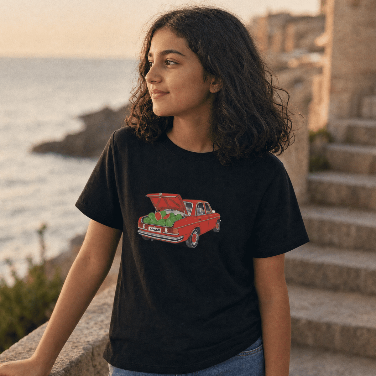 Child wearing Awda watermelon youth t-shirt, Palestinian heritage kids clothing by BOSA