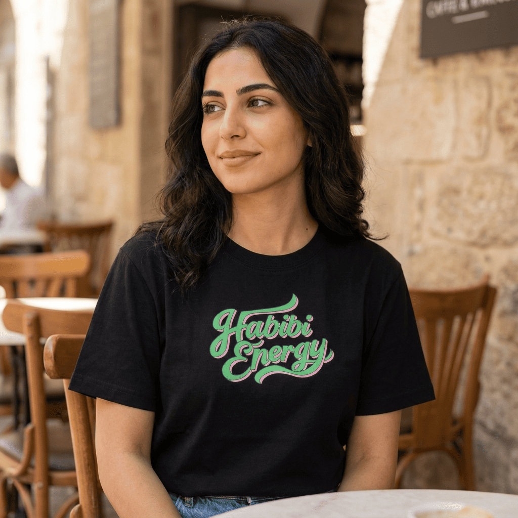 Woman wearing Habibi Energy organic ribbed neck t-shirt, Arabic slogan streetwear by BOSA