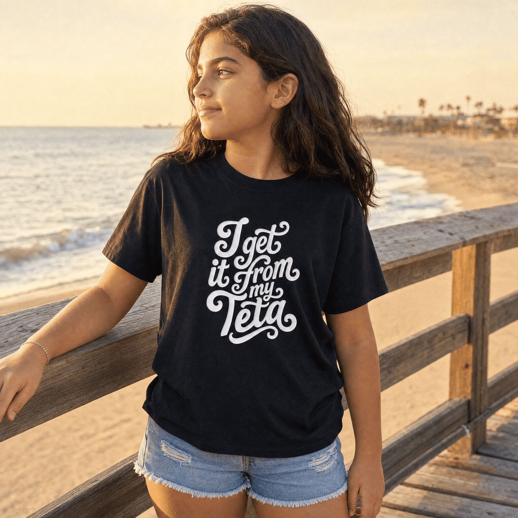 Child wearing I Get It From My Teta youth t-shirt, Arab grandmother slogan kids clothing by BOSA