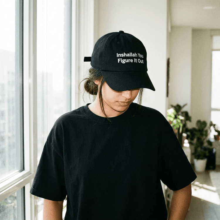 Model wearing Inshallah You Figure It Out dad hat, side angle, Arab humor cap by BOSA