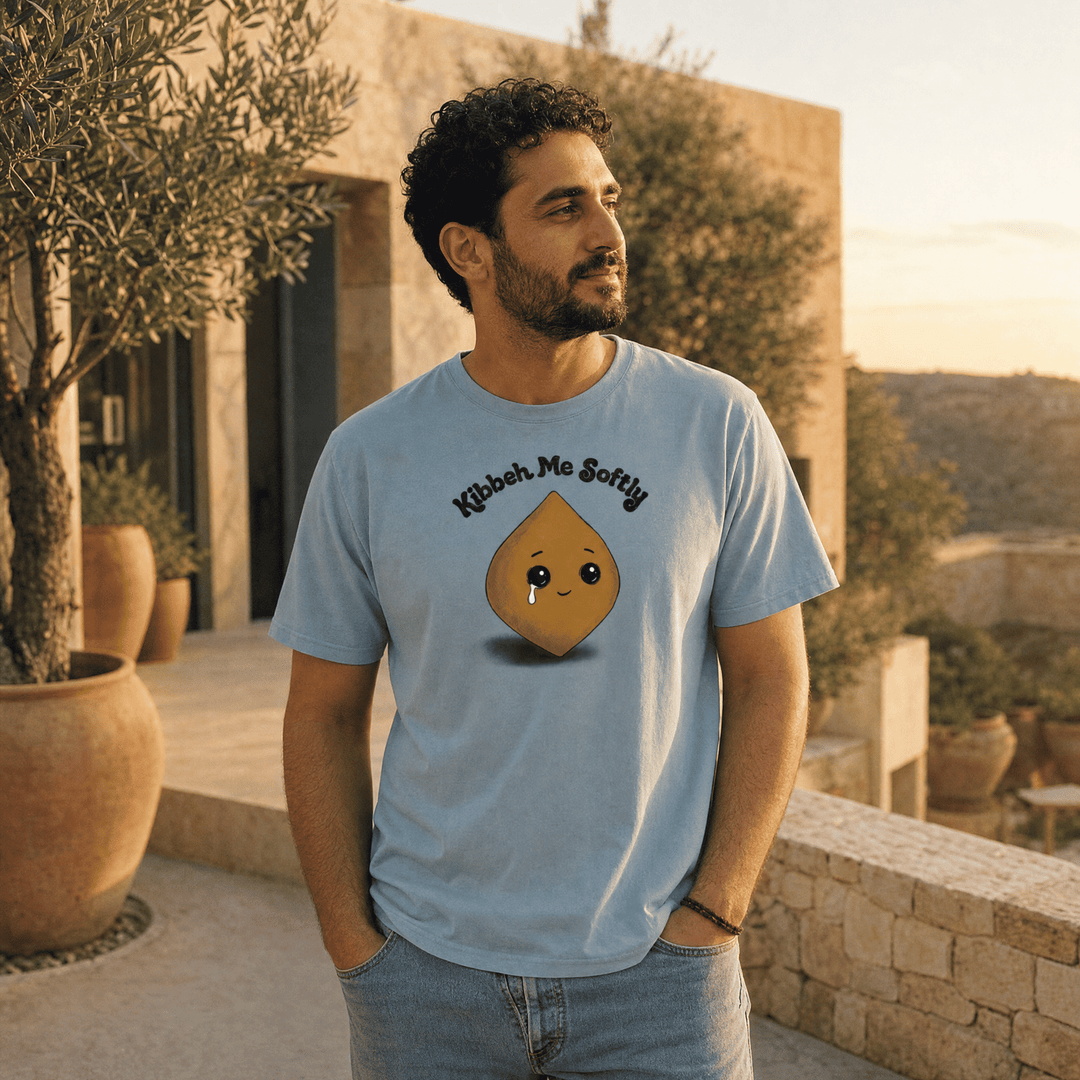 Model wearing Kibbeh Me Softly heavyweight t-shirt, Arab food humor streetwear by BOSA