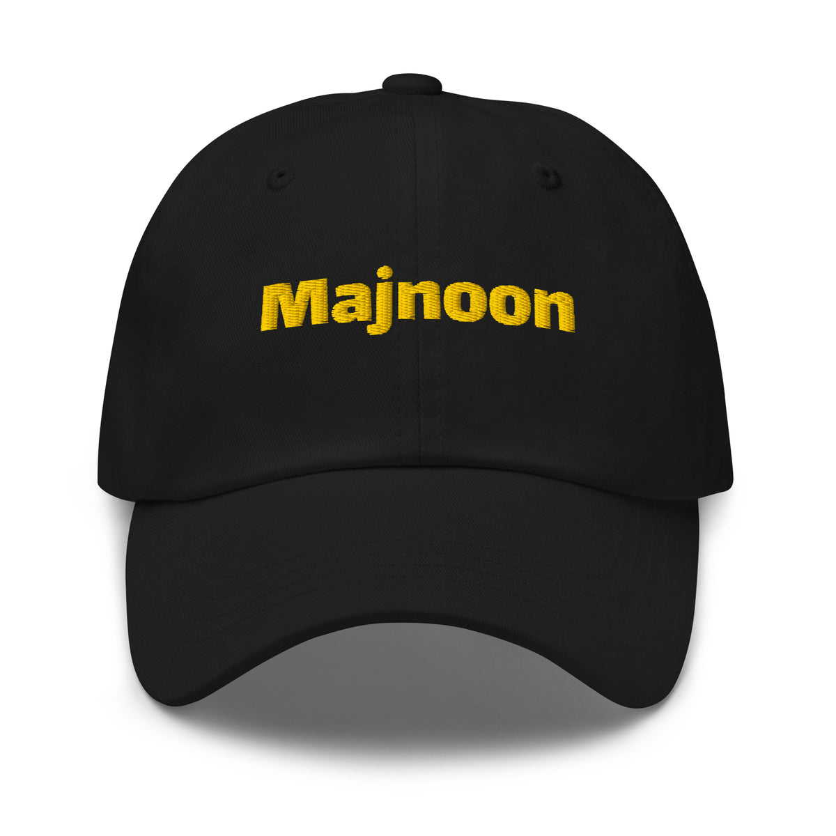 Majnoon embroidered dad hat in black, front view, Arabic slogan cap by BOSA