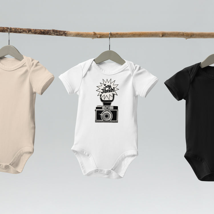 Say Jibneh organic cotton baby bodysuit in white, front view, Arab food humor baby clothing by BOSA