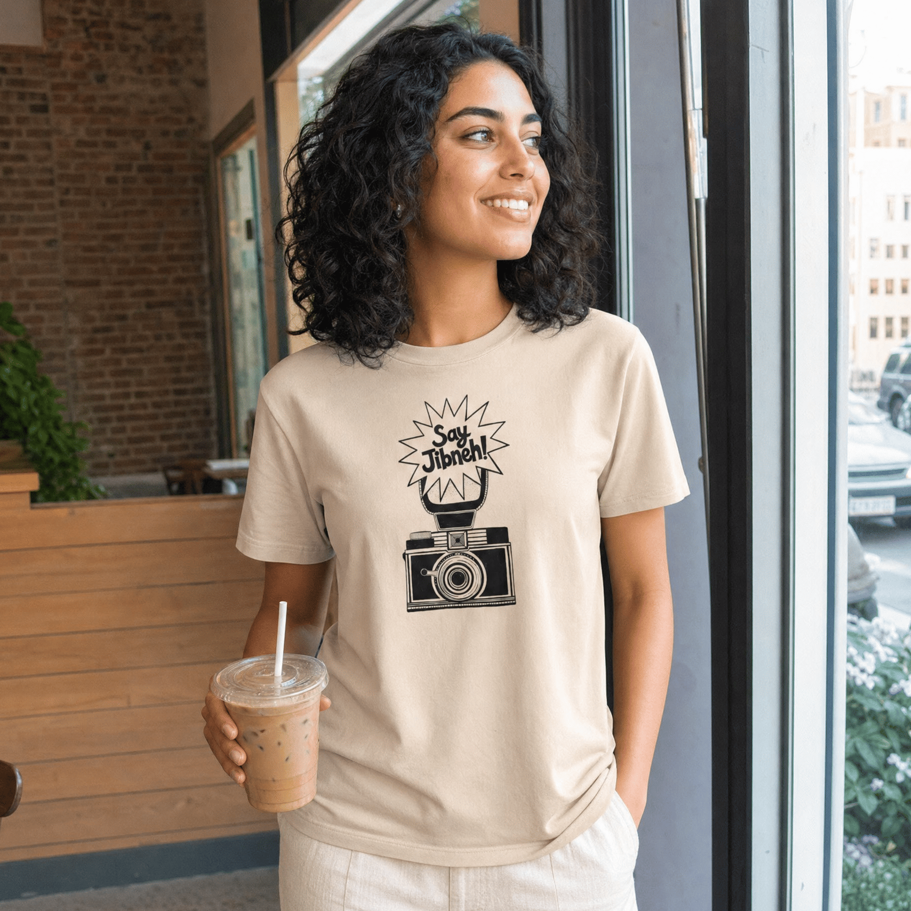 Model wearing Say Jibneh organic cotton t-shirt, Arab food humor streetwear by BOSA