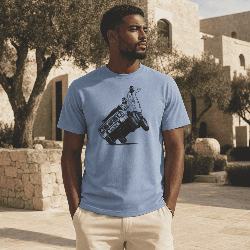Model wearing Sidewheelie heavyweight unisex t-shirt, Arab car culture streetwear by BOSA