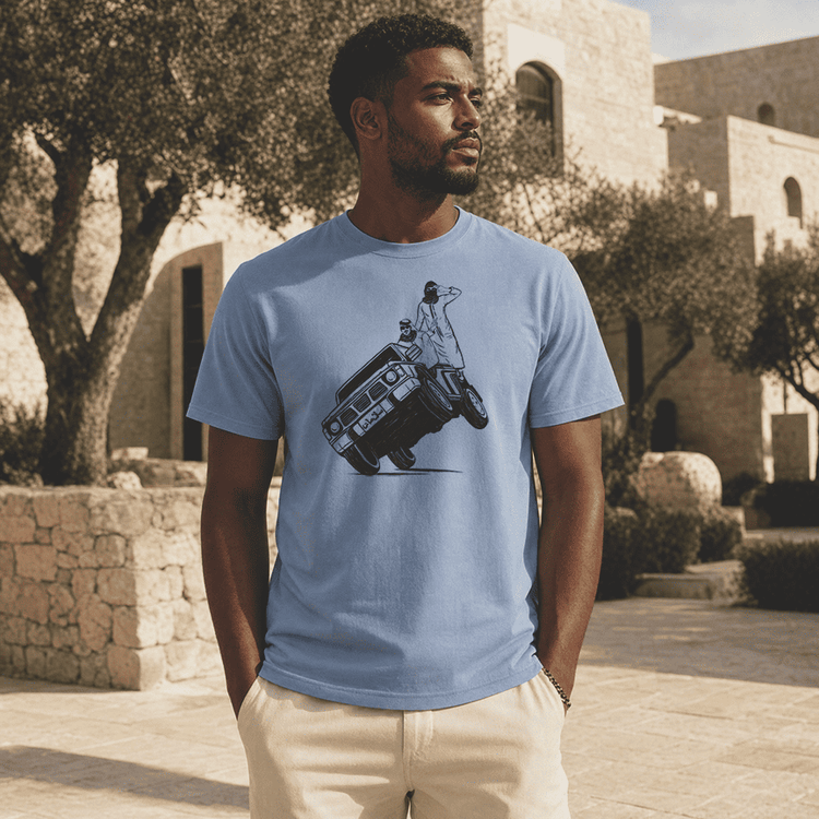 Model wearing Sidewheelie heavyweight unisex t-shirt, Arab car culture streetwear by BOSA